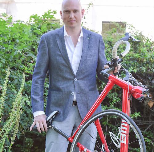 Patrick Knetemann and the wreckage of his bike.jpg